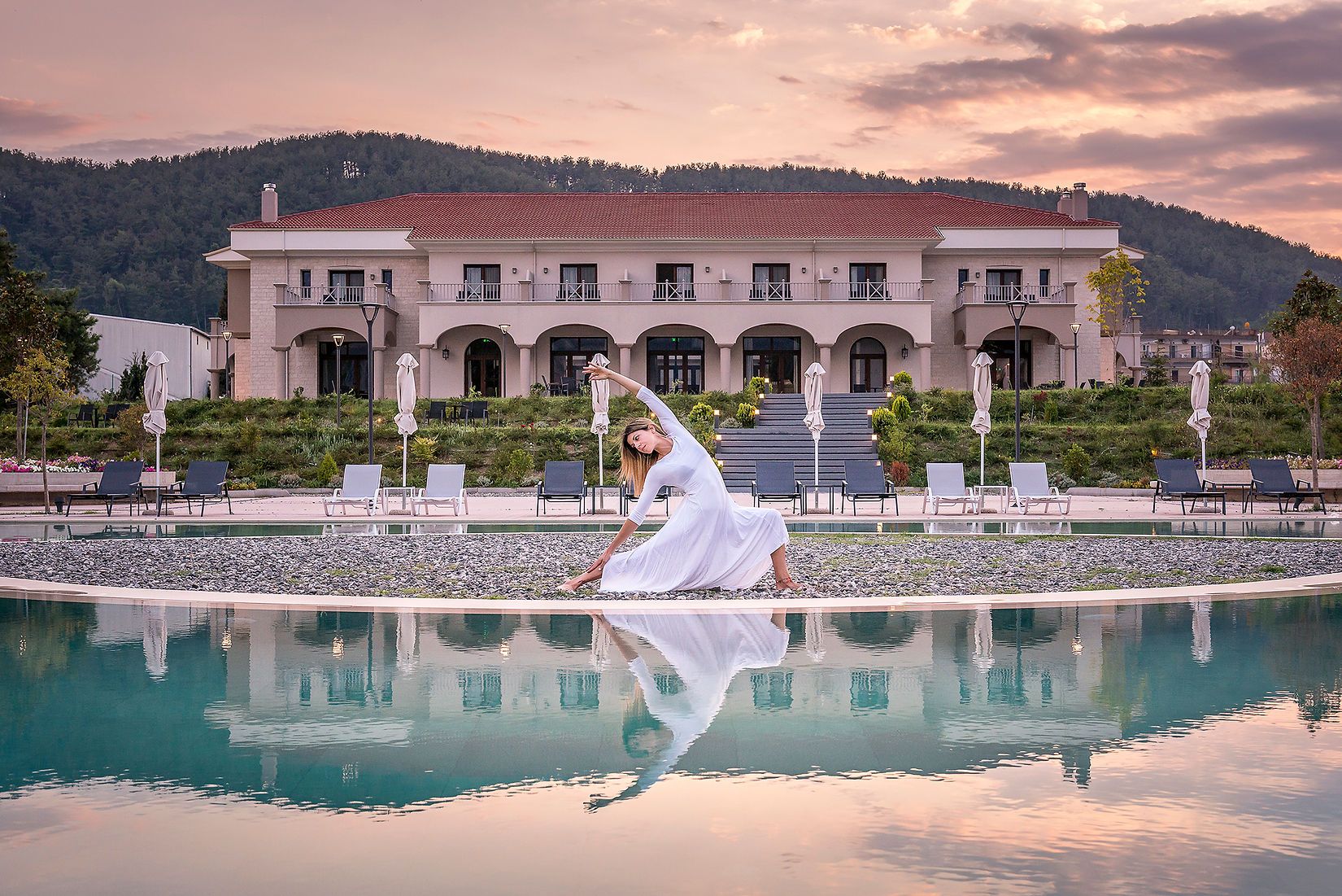 Dancer performing near the Lake Hotel pool